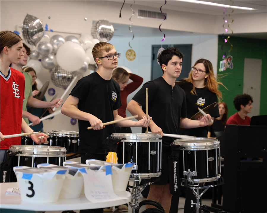  A Lindbergh High School student playing the drums